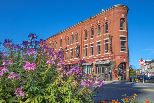 Andover, MA, US-October 8, 2022: View of the Musgrove Building, a charming, 19th century brick building housing mulitple local businesses.