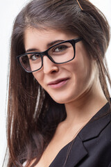Obraz premium Young professional woman smiling and looking at camera