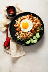 Nasi goreng- Indonesian fried rice with fried egg.