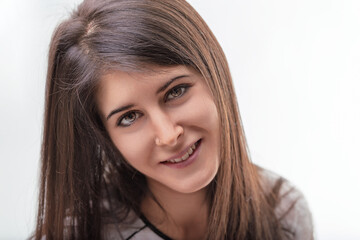 Fototapeta premium Young woman smiling and expressing positive emotions