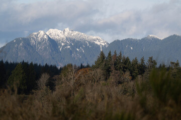 Fototapeta premium Snow covered mountains in Vancouver, British Columbia, Canada. Landscape background