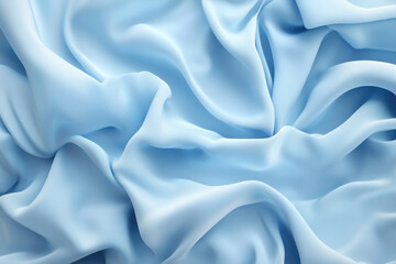 Obraz premium A smooth, light blue fabric draped elegantly, showcasing soft folds and texture.