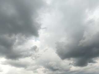 Obraz premium Dark storm clouds gathering overhead, creating a textured pattern in the sky, clouds, overhead