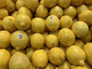 A Bountiful Pile of Freshly Harvested Lemons Ready for Sale at the Market
