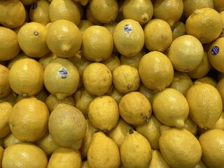 A Bountiful Harvest of Fresh Yellow Lemons Ready for Juicing or Culinary Delights