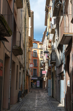 People walking through the city of Olot in Girona, Catalonia in Spain in October 2024.