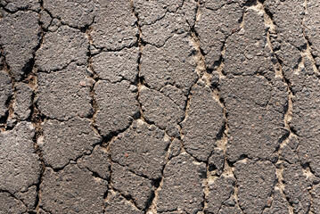 Cracked asphalt texture. Top view. Asphalt. Road background