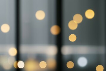 Golden bokeh lights blur. Abstract background with soft, warm bokeh lights; evokes feelings of warmth and comfort.