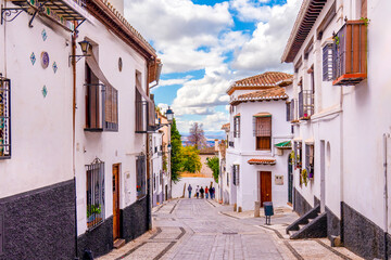 Fototapeta premium Beautiful street and houses in Albayzin Neighborhood Granada, Spain