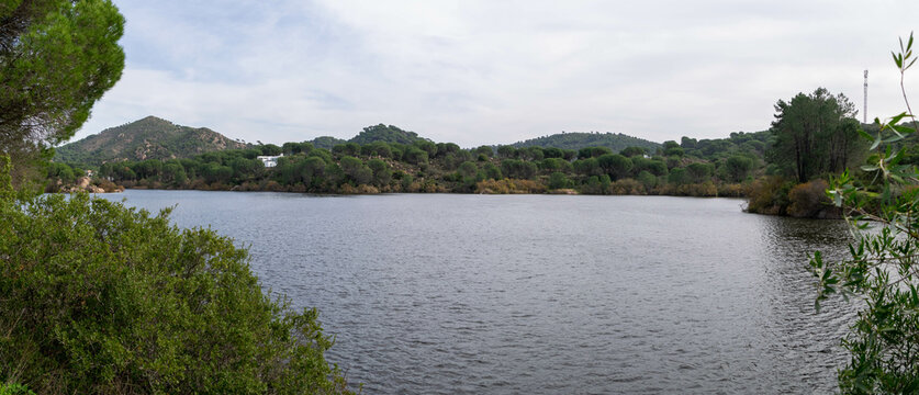 Scenic Landscape with Lake and Green Hills