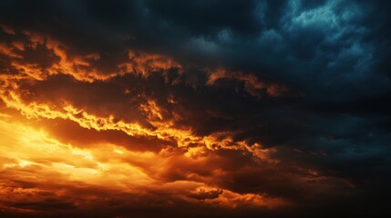 Fototapeta premium Dramatic sunset clouds mixed with dark stormy skies during evening hours