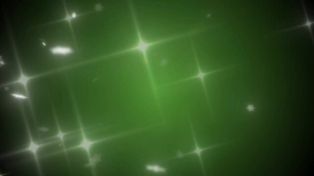 &Eacute;toiles de neige blanches en mouvement suspendu sur fond vert, effet de particules scintillantes pour c&eacute;l&eacute;brations festives et ambiance hivernale espace n&eacute;gatif copyspace - No&euml;l nouvel an St Patrick