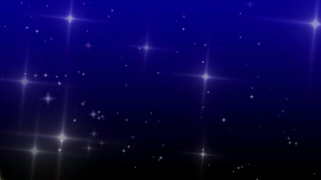 Scintillements et particules en forme d'&eacute;toiles sur fond bleu nuit, ambiance magique et f&eacute;erique pour c&eacute;l&eacute;brations et &eacute;v&eacute;nements festifs espace n&eacute;gatif copyspace. - No&euml;l, nouvel an, anniversaire