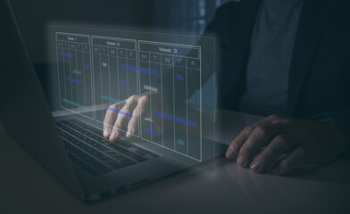 Businessman use calendar for appointments and organize agenda. Planning events on virtual screen.