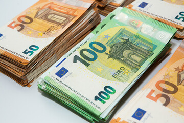 Euro banknote cash money. Lot of banknotes of European union currency close up. Financial investment, savings, income earnings concept.