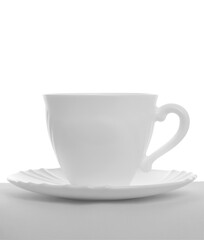 Empty tea cup with saucer isolated on white background