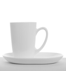 Empty tea cup with saucer isolated on white background