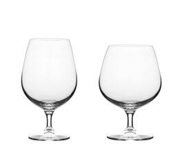 Glass of scotch whiskey and emty glass on a white background