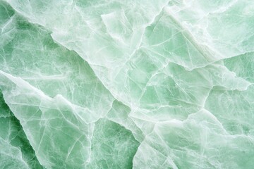 Obraz premium Pale Green Translucent Stone Texture - Serene Macro View of Organic Mineral Pattern for Design and Geology (193 characters)