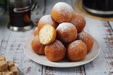 Quarkbelllchen, traditional German dessert made of cotton cheese and dough	