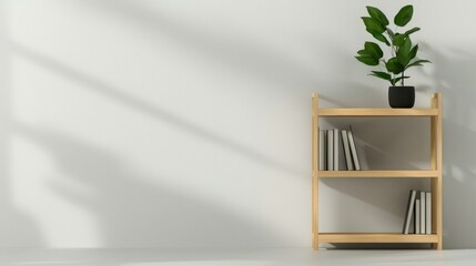 Obraz premium corner of a room with a wooden shelf on the right side. The shelf is made of light-colored wood and has three shelves. On top of the shelf, there is a small potted plant with green leaves.