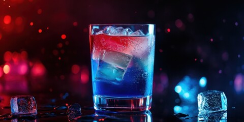 A neon blue and red layered drink with glowing ice cubes and subtle sparkling accents,