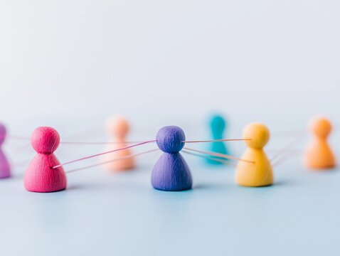 Symbolic representation human networking using colorful figures teamwork abstract social business diagram pawns objects concept connected dots