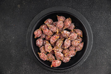 small smoked sausages appetizer mini salami sausage kabanosy fast food fresh tasty food dish delicious gourmet food background on the table rustic food top view copy space