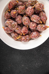 small smoked sausages appetizer mini salami sausage kabanosy fast food fresh tasty food dish delicious gourmet food background on the table rustic food top view copy space