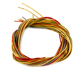 Close-up of multi-wire cables bundle plaited to circle isolated on white background. Colored wiring assembly of copper conductors with plastic insulation.