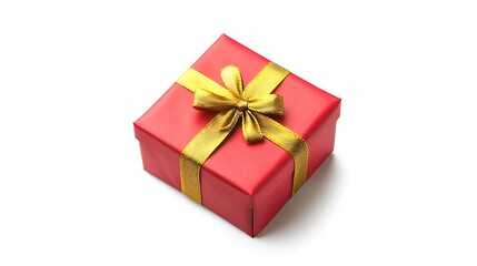 Obraz premium A red gift box with a gold ribbon and bow against a white surface.
