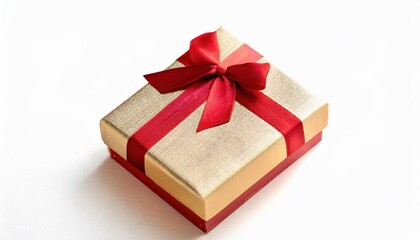 Obraz premium Luxurious Golden Gift Box with Red Ribbon Bow on White Background, Perfect for Christmas, Holiday Celebrations, Birthdays, or Special Occasions, Representing Elegance, Joy, and Generosity