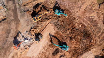 Aerial view road motor grader flatting dirt road surface, Motor grader road construction grader...