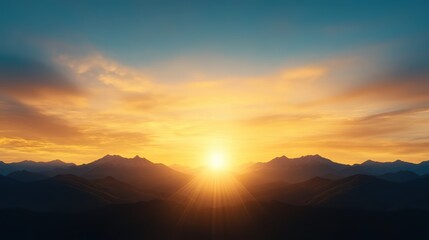 Obraz premium A breathtaking sunrise over a mountain range, showcasing vibrant hues of orange and blue, ideal for nature-related projects, travel blogs, or environmental campaigns,