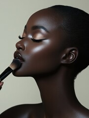 Woman applying makeup for a flawless, radiant look.