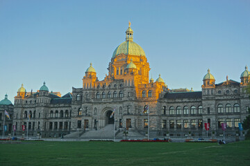 Victoria, British Columbia, Canada: The Neo-Baroque architecture of the British Columbia Parliament Buildings (1897), at sunset.