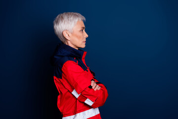Photo of lovely retired lady profile crossed hands wear uniform paramedic experienced doctor...