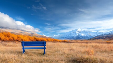  a blue bench sitting in the middle of a field surrounded by lush green grass and trees, with majestic mountains in the background and fluffy white clouds in the sky