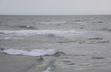 Place called Grenen in Denmark where the North Sea and the Baltic Sea meet and the waves crash...
