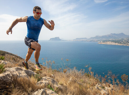 Outdoor run along seaside trail with stunning mountain views