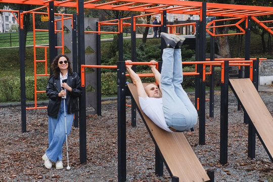 Outdoor fun: friends enjoying workouts at the park