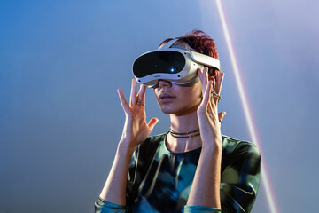 Woman exploring virtual reality in a futuristic backdrop