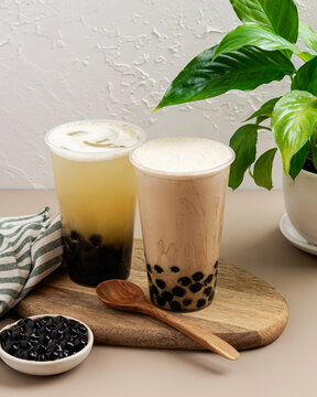 Refreshing Bubble Tea with Tapioca Pearls and Wooden Spoon