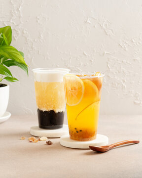 Refreshing teas with lemon and tapioca served in clear glasses