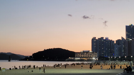 Beautiful OCEAN View from Haeundae Beach during a stunning sunset, in Busan, South Korea, creating a peaceful and beautiful horizon