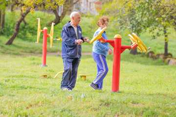 Fototapeta premium senior couple practicing exercise outdoors