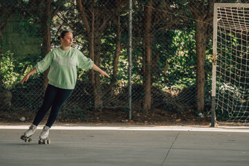 skater training with skates outdoors