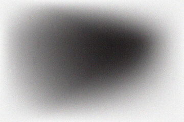 Dark grainy background with light spots creating gradient effect