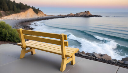 Obraz premium A wooden bench overlooking a serene ocean view with a rocky coastline and a hazy, pastel-colored sky