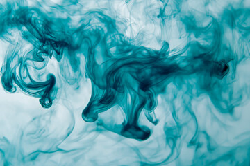 Abstract teal ink flowing in water creating mesmerizing patterns